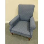 Victorian low armchair upholstered in a