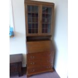 Oak bureau bookcase with twin glazed doo