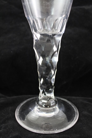A LATE 19TH CENTURY GOBLET OF LARGE PROPORTION having tapering bowl on facet cut stem and domed - Image 2 of 2