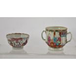 A 19TH CENTURY DOUBLE HANDLED FAMILLE ROSE CUP, decorated with figures, flowers and birds, 8cm high,