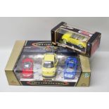 A BURAGO GIFT COLLECTION SET OF DIE-CAST MODELS 1:24 and 1:18 scale including VW new beetle 1998,
