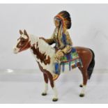 A BESWICK CERAMIC FIGURE OF A NORTH AMERICAN INDIAN MOUNTED UPON A SKEWBALD HORSE, no.1391, 21cm