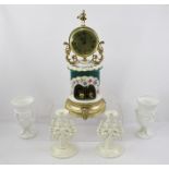 A DECORATIVE ITALIAN PORCELAIN AND BRASS CASED MANTEL CLOCK 42cm high together with a garniture pair