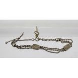 A FANCY SILVER COLOURED METAL ALBERT comprising two rope rows and a box link between with fancy