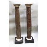 A PAIR OF 19TH CENTURY ROSSO ANTICO MARBLE DISPLAY COLUMNS with white marble collars, on squared