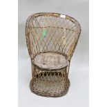 A CHILD'S WICKER GARDEN CHAIR, height of back 55cm