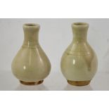 TWO POSSIBLY MING, SMALL YIN CHING VASES with banded decoration, approximately 9cm high