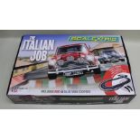 A SCALEXTRIC 'THE ITALIAN JOB' SET in sealed original vendors box, 1:32 scale complete with red