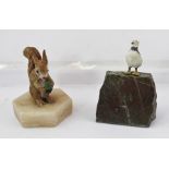 A PAINTED COLD CAST METAL MODEL OF A GULL, mounted on a stone block 10cm high, together with a