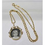 AN EDWARDIAN 9CT GOLD PICTORIAL CHARM SET with seed pearls on modern bright cut fancy gold