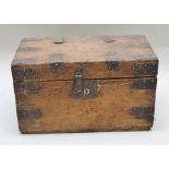A 19TH CENTURY METAL BANDED PINE STORAGE TRUNK fitted iron carrying handles, 49cm wide