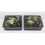 A PAIR OF EARLY 20TH CENTURY PAPIER MACHE AND JAPANNED TRINKET BOXES, each decorated with flowers,