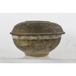 A PROBABLY CHINESE HAN DYNASTY COVERED COOKING POT with traces of decoration and paint, 12cm high