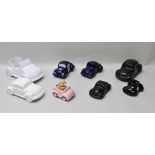 A COLLECTION OF EIGHT VARIOUS GLAZED POTTERY MODELS OF VW BEETLES including 1:20 scale Cabriolet,