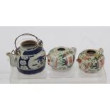 TWO SMALL 19TH CENTURY CHINESE CHING DYNASTY FAMILLE VERTE ENAMELLED TEAPOTS, showing auspicious