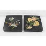 A PAIR OF EARLY 20TH CENTURY PAPIER MACHE AND JAPANNED TRINKET BOXES, each decorated with flora,