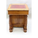 A VICTORIAN SATINWOOD DAVENPORT DESK, the slope with tooled leather writing surface, opening to