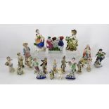 A QUANTITY OF CONTINENTAL CERAMIC FIGURINES, including faux Chelsea designs