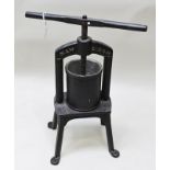 A "MAW AND SONS" 19TH CENTURY CAST IRON TINCTURE PRESS, height to shoulders 64cm