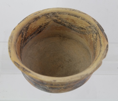 A PROBABLY NEOLITHIC DOUBLE HANDLED BOWL with scrolling decoration, approximately 15cm diameter - Image 2 of 2