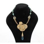 AN ART NOUVEAU GILT METAL CHOKER PENDANT set with turquoise coloured beads and a simulated zircon