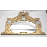 A PROBABLY CONTINENTAL 19TH CENTURY ROCOCO STYLISED FANCY SHAPED MIRROR BACKED OVERMANTEL, with