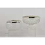 TWO EARLY 20TH CENTURY CUT GLASS FRUIT BOWLS, each with a silver rim, one hallmarked Birmingham