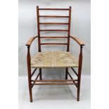 AN ARTS AND CRAFTS LADDER BACK OPEN ARMCHAIR with woven seagrass seat (by High Wycombe Chair Maker