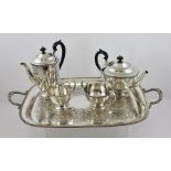 A SILVER PLATE ON COPPER TWO-HANDLED TEA TRAY with scallop cast decoration and gadrooned rim,