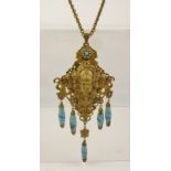 AN EARLY 20TH CENTURY ART NOUVEAU INFLUENCED PENDANT NECKLACE fashioned with female mask head and