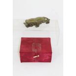 A JADE CARVED MOTTLED GREEN FIGURE OF A PROWLING BEAST, approximately 5cm high x 16cm long