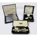 THREE SILVER SETS comprising; Christening set, Viner Sheffield 1938 cased, an eggcup and pusher,