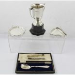 A SELECTION OF SILVER ITEMS including a two-handled trophy cup, un-engraved, a pair of sugar