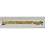 AN 18CT GOLD BRACELET, of fine mesh form with abstract marked bars, the clasp marked .750, 52g.