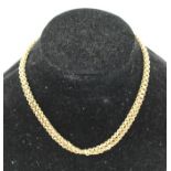 A 9CT. GOLD BELCHER CHAIN with clip mount, 28g.