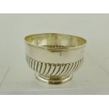 A TRADITIONAL VICTORIAN SILVER PEDESTAL BOWL, having applied wire rim, swirl reeded lower belly