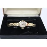 A 9CT GOLD LADY'S ACCURIST WRIST WATCH, having 21-jewel mechanism with 9ct gold bracelet strap, in