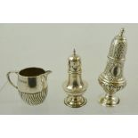 CHARLES EDWARDS A VICTORIAN BARREL SHAPE SILVER CREAM JUG, a silver pedestal PEPPERETTE, and a SUGAR