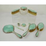 LEVI & SALAMAN A PART SILVER MOUNTED AND TURQUOISE GUILLOCHE ENAMELLED DRESSING TABLE SET,