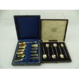 FLETCHER & SON A SET OF SIX SILVER AND BEAN TERMINAL COFFEE SPOONS, Sheffield 1923, cased, and SEVEN