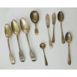 A MISCELLANY OF SILVER FLATWARE comprising; three fiddle pattern dessert spoons, two butter