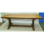 A LARGE PLANK TOPPED REFECTORY STYLE TABLE, supported on double baluster column base with block