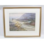 E. GODDARD "Shepherd and his flock", on a Highland track, a Watercolour, signed, 34cm x 49cm in gilt