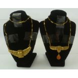TWO EGYPTIAN REVIVAL NECKLACES, a winged bird Art Deco and a Pharaoh head