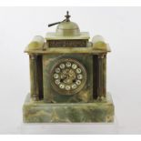 A LATE 19TH CENTURY FRENCH GREEN ALABASTER MANTEL CLOCK, having pagoda style case with brass