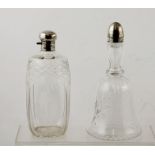 A CUT GLASS DECANTER with a "Walker & Hall" silver screw cap, Sheffield 1932, together with one