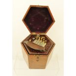 A "LACHENAL & CO.." CONCERTINA, with silver plated finger plates, in hexagonal mahogany case