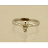 A DIAMOND SOLITAIRE, having marquise cut single stone, in rhodium finished 18ct gold setting, size K