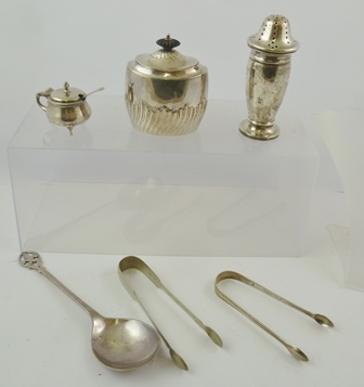 A SELECTION OF SILVER ITEMS to include; a silver tea caddy, sugar caster, mustard and pair of