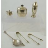 A SELECTION OF SILVER ITEMS to include; a silver tea caddy, sugar caster, mustard and pair of